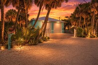 Waterfront Luxury Meets Unmatched Garage Space on the Highly Desirable Manasota Key